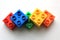 Closeup photo with rainbow colors of LEGO bricks isolated on the white background