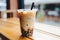 Closeup Photo Showcases Tantalizing Taiwan Milk Bubble Tea, Also Known As Boba, In Plastic Cup On Wo