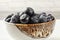 Closeup photo - small bowl full of blueberries