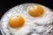 Closeup photo of two scrambled eggs