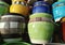 Closeup photo of Various painted ceramic pots,Colorfull vase