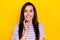 Closeup photo of young attractive woman surprised unexpected sale good mood isolated on yellow color background