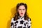 Closeup photo of young crazy confused unhappy lady curly ponytails hair wear trendy cowskin crop top isolated on yellow