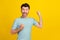 Closeup photo of young funny guy celebrate fists up hooray victory screaming isolated on bright yellow color background