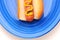 Closeup Picnic Table with hot dog on plate