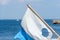 A closeup picture of a blue and white dive flag. Blue ocean background