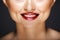 Closeup picture of cheerful girl`s lips with glamour lipstick