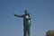 A closeup picture of Dr. Ambedkar statue or bust against a blue sky