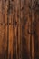 Closeup picture of old rustic wooden planks eaten by caries