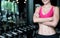 Closeup pictures of young woman in relaxed sports clothing after exercising at the gym