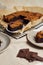 Closeup of a piece of freshly baked delicious pumpkin swirl brownie on a plate