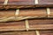 Closeup of pile of bamboo flooring mats in rural Southeast Asia