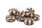 Closeup pile cappuccino candies white background