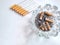 Closeup of a pile of cigarettes over white background. The tobacco can cause numerous damages to the organism