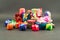 Closeup pile of gift boxes wrapped by colourful paper