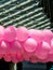 Closeup of a pile of pink balloons