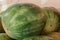 Closeup of a pile of watermelons in a market