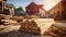 Closeup pile of wood with blurred house under construction in background