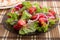 Closeup plate with a salad of chopped tomato slices