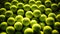 Closeup of a plenty of tennis balls on an empty tennis court, the sunshine. Sports lifestyle concept. Generative AI