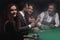 Closeup.poker players sitting at a casino table