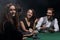 Closeup.poker players sitting at a casino table