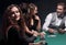 Closeup.poker players sitting at a casino table