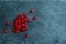 Closeup on pomegranate grains on stone substrate