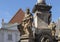 Closeup portion stone fountain surrounding a Plague Column in Cesky Krumlov erected in the 1570`s.