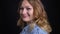 Closeup portrait of adult caucasian female turning to camera smiling and raising eyebrows with background isolated on