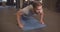 Closeup portrait of adult muscular athletic caucasian man making push ups in the gym indoors