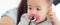Closeup portrait of asian newborn, happiness face little baby girl with innocent.