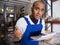 Closeup portrait of astonished hispanic warehouse worker with papers