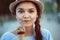 Closeup portrait of beautiful happy white Caucasian brunette girl woman with dimples on cheeks eating ice-cream