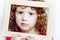 Closeup portrait of a beautiful little curly girl