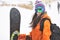 Closeup portrait of beautiful snowboarder girl wearing mask