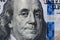 Closeup portrait Benjamin Franklin on 100 us dollar bill.