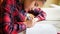 Closeup portrait of concentrated girl writing task with pen in copybook