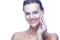 Closeup Portrait of Cute Sensual Caucasian Woman with Fresh and Clean Skin Holding Facial Sponge for Facial Treatment,