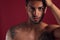 closeup portrait of handsome topless male model with beautiful brown eyes