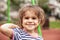 Closeup portrait of happy smiling little girl.