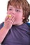 Closeup portrait of kid eating an apple