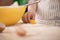 Closeup portrait of little child cooking egg