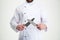 Closeup portrait of a male chef cook sharpening knife