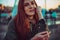 Closeup portrait natural redhead girl. Thick long red hair. Unusual beauty. Freckled skin face. Ginger freckles. Authentic people