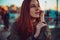 Closeup portrait natural redhead girl. Thick long red hair. Unusual beauty. Freckled skin face. Ginger freckles. Authentic people