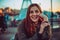 Closeup portrait natural redhead girl. Thick long red hair. Unusual beauty. Freckled skin face. Teeth smile. Authentic people.