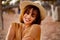 Closeup portrait of smiling young latino woman at the beach