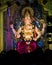 Closeup , portrait view of decorated and garlanded  idol of Hindu God Ganesha in Pune ,Maharashtra, India.