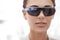 Closeup, portrait and woman with futuristic sunglasses for fashion, technology or protection from sun. Augmented reality